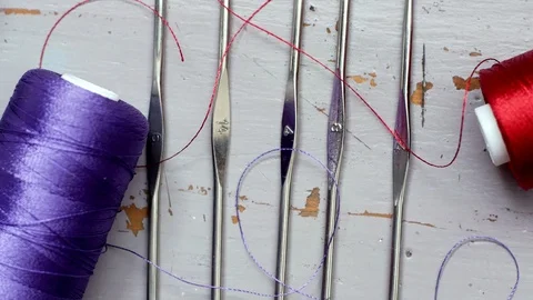 Closeup of thread and hooks for crochet Stock Footage 123690737