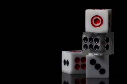 Closeup three dice stacked. Stock Photos