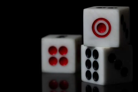 Closeup three dice stacked. Stock Photos