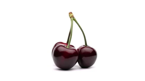 Closeup of three sweet cherries growing from the same stem. Rotating on the Stock-Footage 157066944