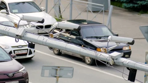 Closeup of three traffic security camera surveillance CCTV on the road Stock Footage 77110521