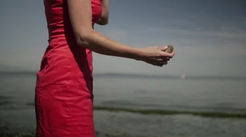 Closeup of Throwing Rocks (Slow Motion) Stock Footage 40273533