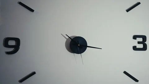Closeup timelapse of clock hands passing fast. Close-up white with black numbers Stock Footage 247115711