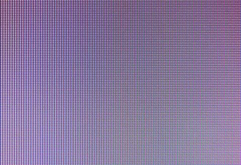 Closeup of tiny pixels on a LED screen background 스톡 사진