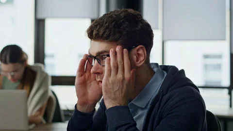 Closeup tired manager analyzing software code. Exhausted developer check project Stock Footage 242987214