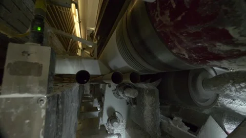 Closeup of a toilet paper machine inside a paper factory Stock Footage 192451260