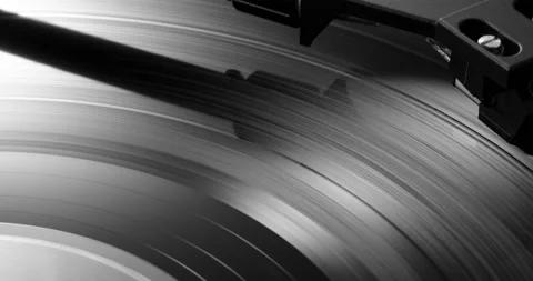 Closeup of tonearm headshell on spinning record Stock Footage 155859609