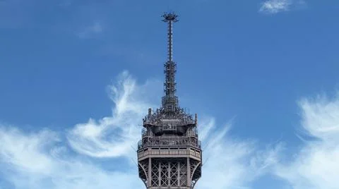 Closeup of top of Eiffel Tower in Paris shot against a blue sky Stock-Fotos