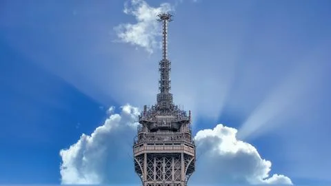 Closeup of top of Eiffel Tower in Paris shot against a blue sky Stock-Fotos