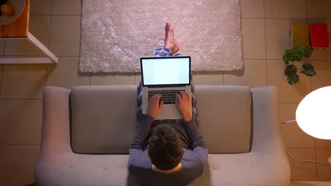 Closeup top shoot of young businessman working on the laptop with green screen Stock-Footage 106959305