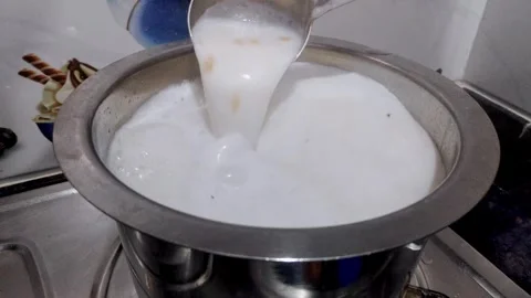 A closeup top shot of preparing creamy semiya or vermicelli or seviyan swee.. 스톡 동영상 314641332