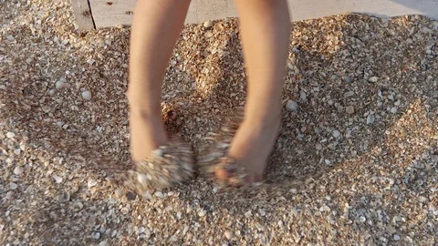 Closeup top view of cute small legs of little child Stock Footage 92937294