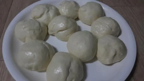 Closeup top view of fresh raw dough ball ready to be baked 写真素材