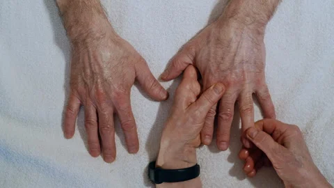 Closeup Top View of Hand Massage by Female Masseur on Senior Client 库存影片 311373637