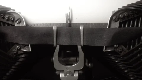 Closeup top view on typing batwing typewriter.  black and white, glow Stock Footage 89306503