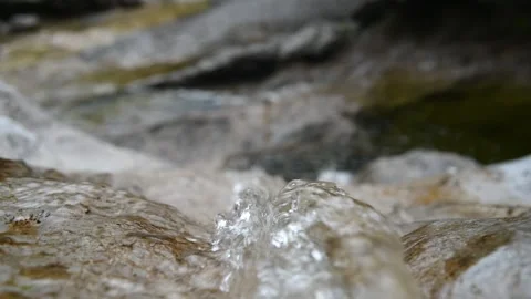 Closeup of the top a waterfall of a mountain river (bokeh) Stock-Footage 212743300