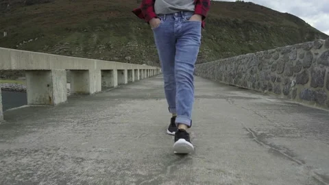 Closeup tracking of feet walking Stock Footage 219848451