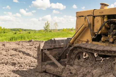 Closeup of the Tracks of a Caterpillar Machine Stock Photos