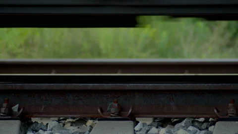 Closeup of Train Wheels on Railroad as it is passing by. Stock Footage 167044774