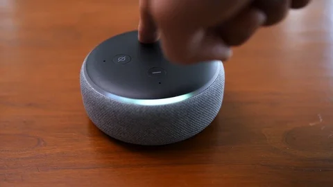 Closeup of Turning Volume Up and Down with Buttons on Smart Speaker 스톡 동영상 99733409