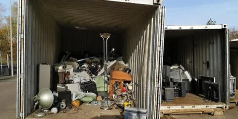 Closeup of two containers of large-size garbage collection station in Germany Stockfoto's
