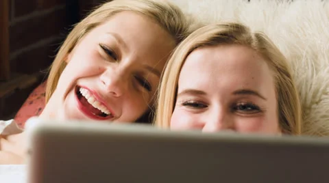Closeup Of Two Friends Using A Tablet Together Stock Footage 36564804