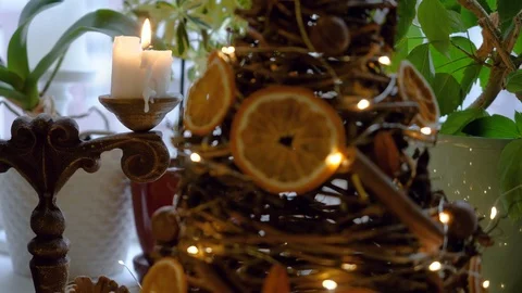 Closeup of two lighted white Christmas candles in an antique candlestick. 4K Stock-Footage 122729944