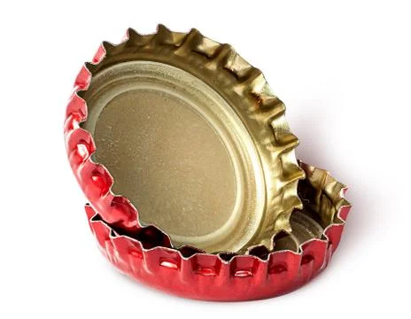 Closeup of two red caps from beer bottles Stock Photos