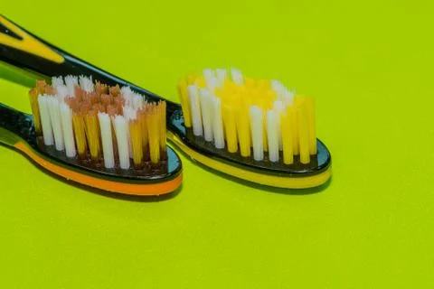 Closeup of two toothbrushes Stock Photos