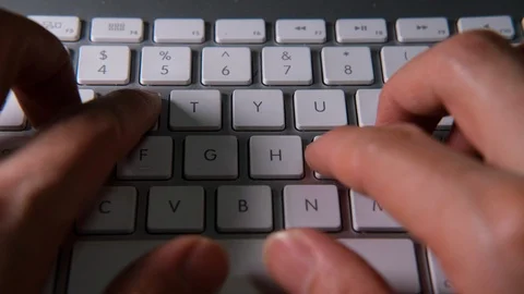Closeup of typing on a computer keyboard Stock Footage 126763091