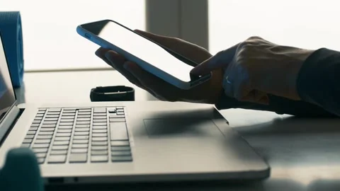 Closeup typing text message browsing scrolling smartphone of attractive African Stock-Footage 336249650