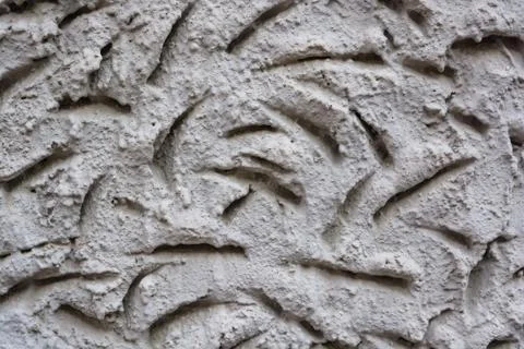 Closeup uneven plaster texture background Stock Photos