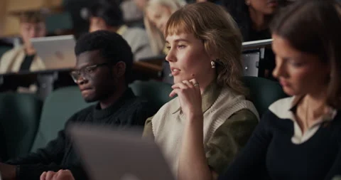 Closeup University Students in lecture Hall Use Laptops Stock Footage 326417093
