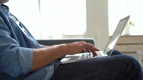 Closeup unrecognizable man working on laptop. Male hands typing laptop computer Stock Footage 139746047