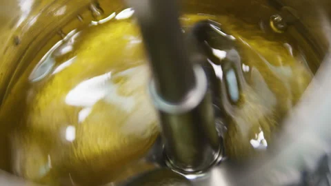 Closeup upper view yellow liquid mixed with tool at lab test Stock Footage 93782567