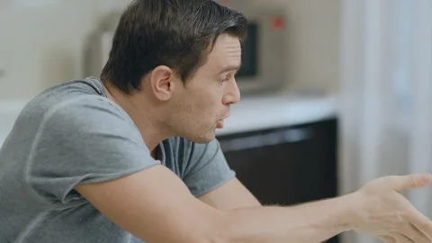 Closeup upset couple arguing at kitchen because of misunderstanding. Stock Footage 116697715
