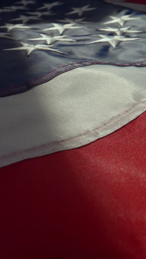 Closeup of USA Flag on Horizontal Surface with Slow Push-In Camera Movement Stock-Footage 346905229