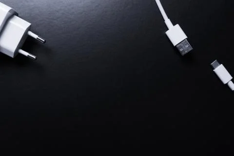 Closeup of USB cable. Isolated on black background Stock Photos