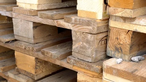 Closeup of used wooden pallets in stack in the warehouse. Wooden pallet Stock Footage 113054822
