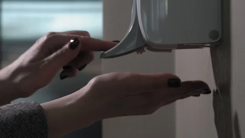 Closeup using hand sanitizer on the wall spbd. washing hands with antiseptic Stock Footage 128244038
