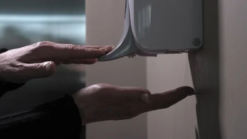Closeup using hand sanitizer on the wall spbd. washing hands with antiseptic Stock Footage 128279343