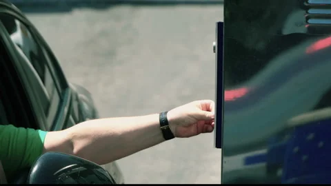 Closeup of using parking ticket card on ticket machine at entrance of parking Stock Footage 140273513