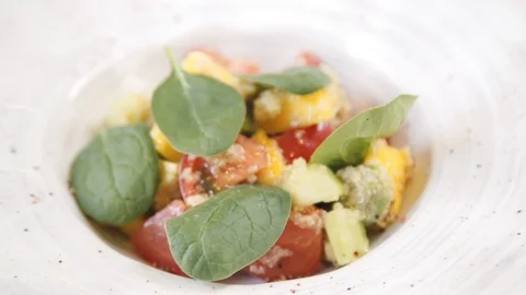Closeup of vegetable salad with quinoa and mango. Stock Footage 112389737