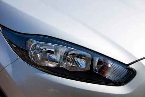 Closeup of vehicle left front head lamp Stock Photos