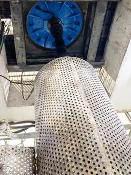 Closeup of the vertical axis of the large pumps Stock Photos