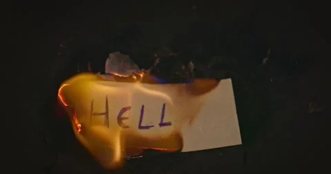 Closeup video of burning paper with HELL written on it Stock Footage 180196052