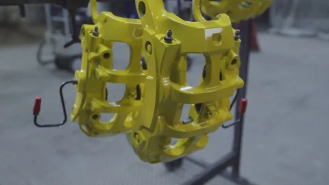 Closeup video of a ceramic brake. Ceramic is used in high performacnce brakes Stock Footage 98839339