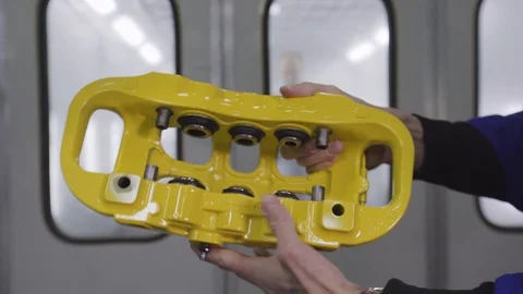 Closeup video of a ceramic brake. Ceramic is used in high performacnce brakes Stock Footage 98839506
