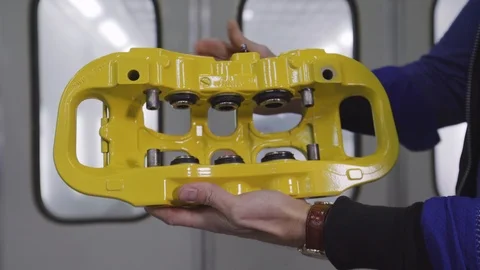 Closeup video of a ceramic brake. Ceramic is used in high performacnce brakes Stock Footage 98839507