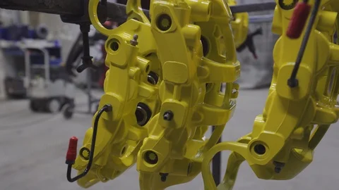 Closeup video of a ceramic brake. Ceramic is used in high performacnce brakes Stock Footage 98839719